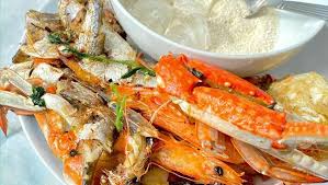 garri and seafood side served at a lagos owambe