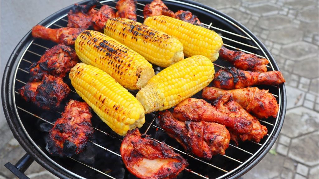 grilled corn and chicken served at a Lagos owambe