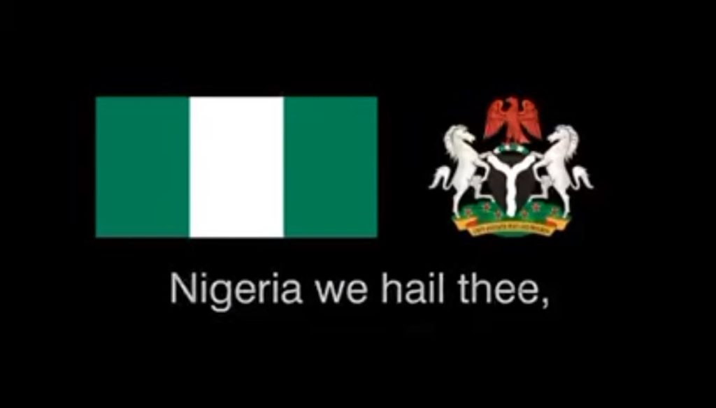 Picture showing the Nigerian flag, coat of arms and the lyrics of the new anthem